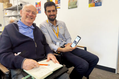 Senior learning about cybersecurity in a seniors tech class Brisbane